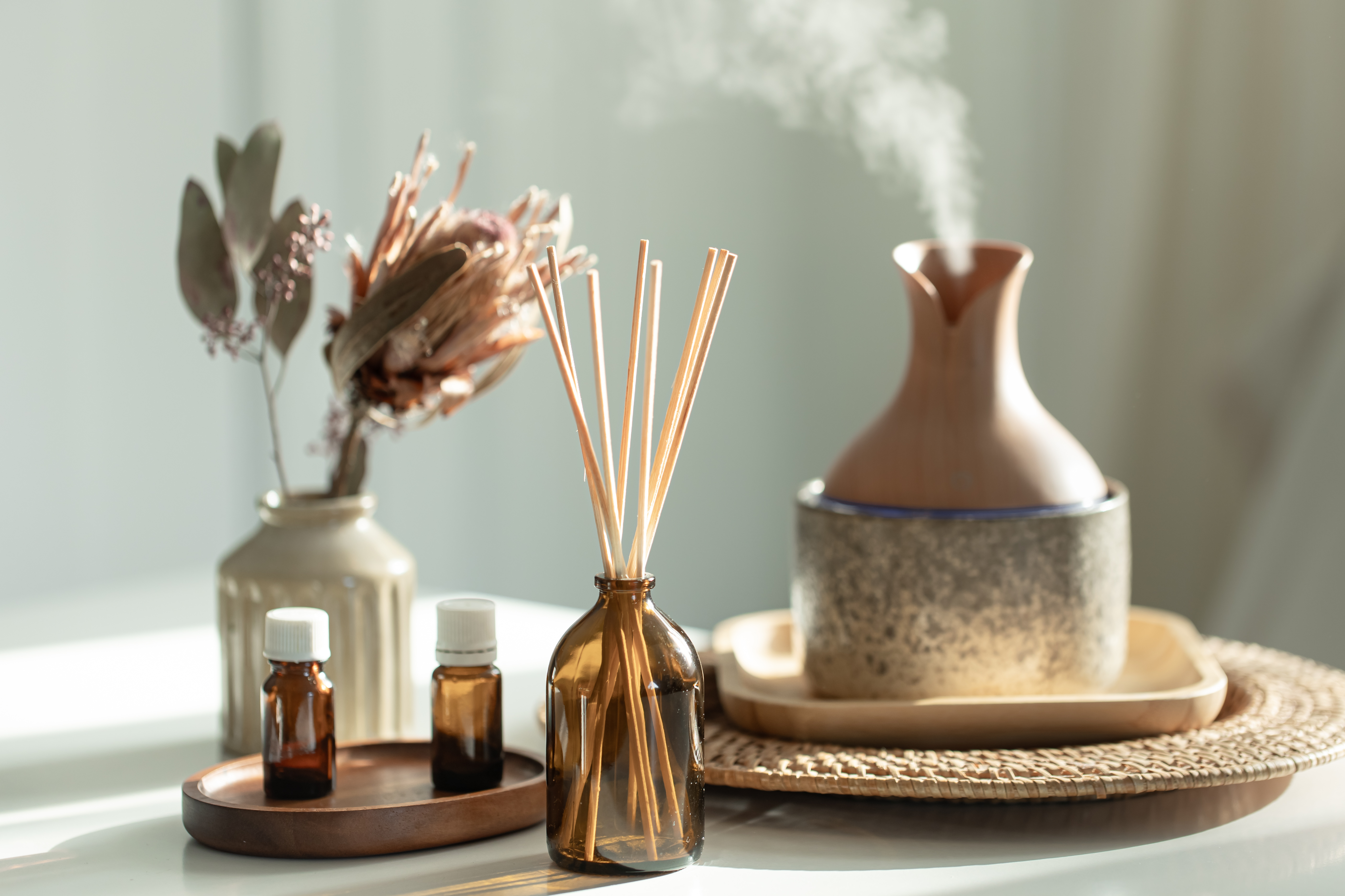 Spa composition with incense sticks, air humidifier and aroma oils.
